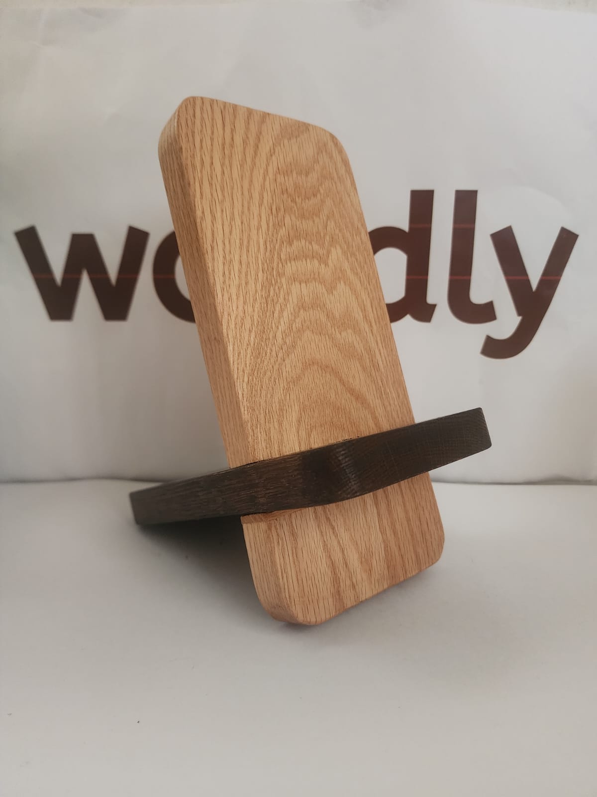 Engraved oak phone stand