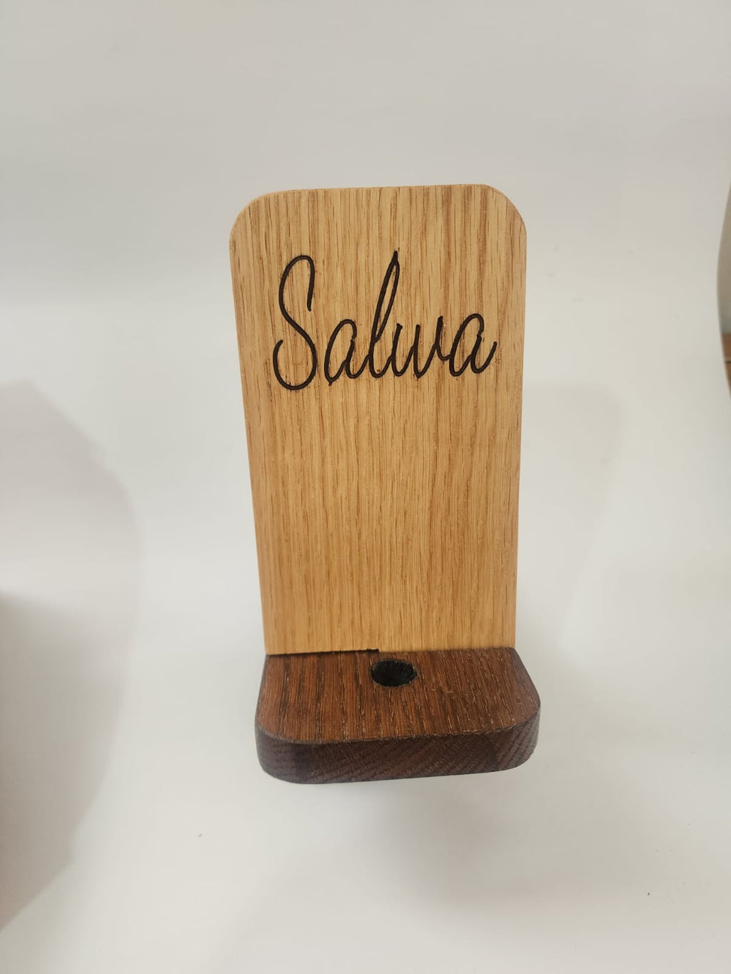 Engraved oak phone stand